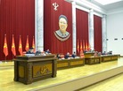 North Korea's KCNA news agency released this photo Monday, saying it shows leader Kim Jong Un (at left) speaking during a plenary meeting of the Central Committee of the DPRK in Pyongyang. Hanging above is the image of his father, former leader Kim Jong Il, who died in 2011. North Korea's KCNA news agency released this photo Monday, saying it shows leader Kim Jong Un (at left) speaking during a plenary meeting of the Central Committee of the DPRK in Pyongyang. Hanging above is the image of his father, former leader Kim Jong Il, who died in 2011.