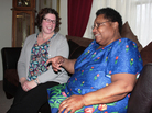 Lawyer Meredith Watts (left) visits client/patient Shirley Kimbrough at her apartment in north Akron, Ohio. Kimbrough is being helped by a program under which lawyers partner up with health providers to supply patients with legal advice. Lawyer Meredith Watts (left) visits client/patient Shirley Kimbrough at her apartment in north Akron, Ohio. Kimbrough is being helped by a program under which lawyers partner up with health providers to supply patients with legal advice.