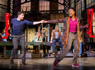 Struggling shoe-factory owner Charlie (Stark Sands, left) is inspired by drag queen Lola (Billy Porter) to make high-quality high-heeled boots for men who perform as women in the Broadway adaptation of the cult film Kinky Boots. Struggling shoe-factory owner Charlie (Stark Sands, left) is inspired by drag queen Lola (Billy Porter) to make high-quality high-heeled boots for men who perform as women in the Broadway adaptation of the cult film Kinky Boots.