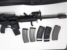 A Bushmaster rifle, similar to the type used by Adam Lanza during the shooting at Sandy Hook Elementary School, and some ammunition magazines. The sale and possession of this type of weapon, and high-capacity magazines, will be severely restricted in Connecticut under new legislation. A Bushmaster rifle, similar to the type used by Adam Lanza during the shooting at Sandy Hook Elementary School, and some ammunition magazines. The sale and possession of this type of weapon, and high-capacity magazines, will be severely restricted in Connecticut under new legislation.