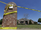 Crime scene tape is seen outside the home of Kaufman County District Attorney Mike McLelland. McLelland and his wife Cynthia were murdered at their home Saturday. Crime scene tape is seen outside the home of Kaufman County District Attorney Mike McLelland. McLelland and his wife Cynthia were murdered at their home Saturday.