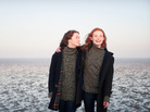 Best friends Rosa (Alice Englert, left) and Ginger (Elle Fanning) are nearly torn apart by the political and social changes of the 1960s. Best friends Rosa (Alice Englert, left) and Ginger (Elle Fanning) are nearly torn apart by the political and social changes of the 1960s.