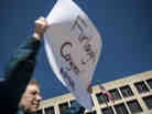 Members of the American Federation of Government Employees protest mandatory federal budget cuts during a rally March 20 in Washington, D.C.