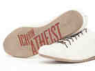 White shoes with the writing "ich bin atheist" on the sole White shoes with the writing "ich bin atheist" on the sole