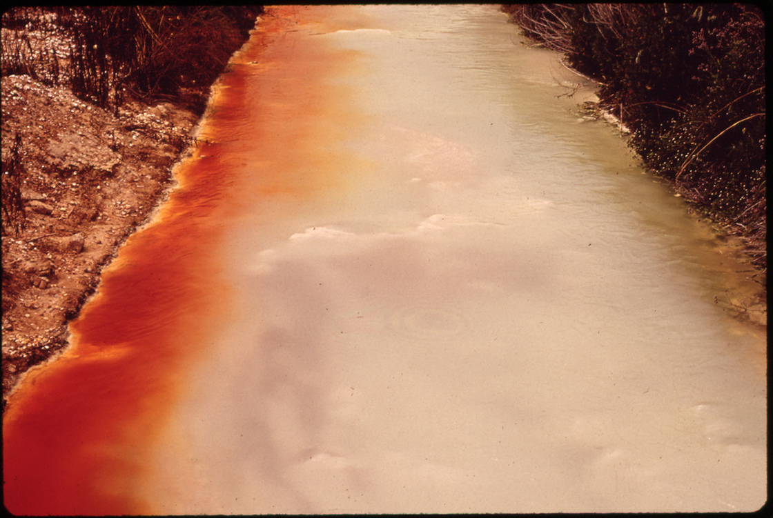 Contaminated water in a drainage ditch behind Pittsburgh Glass Co., Louisiana, 1972.