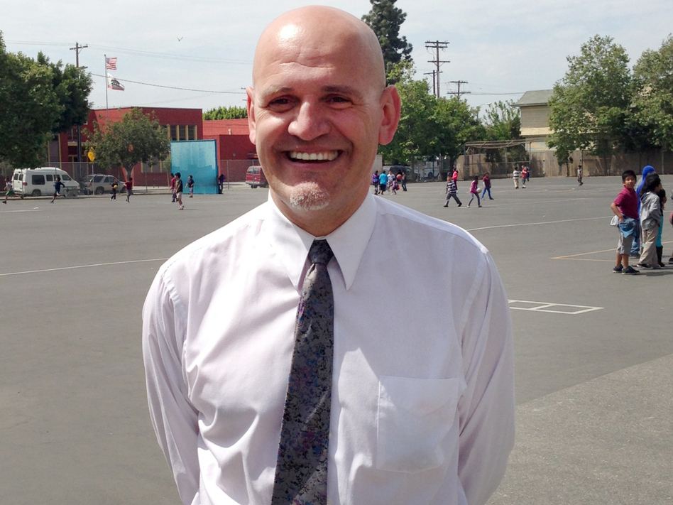 Tenth Street Elementary School's principal, Juan Alfayate, says he thinks the presence of two aides helps make the campus safer for students. Tenth Street Elementary School's principal, Juan Alfayate, says he thinks the presence of two aides helps make the campus safer for students.