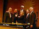 A group of musicians and major donors pose with Lionel Hampton's vibraphone at the 2013 Jazz Appreciation Month launch. From left: Mark Dibner of The Argus Fund, drummer Horacio "El Negro" Hernandez, Fran Morris Rosman of the Ella Fitzgerald Charitable Foundation, pianist Randy Weston, Richard Rosman of the Ella Fitzgerald foundation and Smithsonian American History Museum Director John Gray.