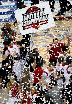 The Louisville Cardinals celebrate after they won 82-76 against the Michigan Wolverines during the 2013 NCAA men's basketball championship at the Georgia Dome Monday night in Atlanta.