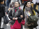Carrying on as usual: Shoppers in central Seoul on Monday. Carrying on as usual: Shoppers in central Seoul on Monday.
