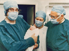 Dr. Robert Edwards holds the world's first "test-tube baby," Louise Brown, on July 25, 1978. A midwife stands in the center, with gynecologist Patrick Steptoe on the right. Dr. Robert Edwards holds the world's first "test-tube baby," Louise Brown, on July 25, 1978. A midwife stands in the center, with gynecologist Patrick Steptoe on the right.