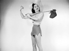 Woman hitchhiking with a bindle. Woman hitchhiking with a bindle.