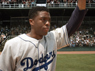 Brooklyn Dodgers first baseman Jackie Robinson (Chadwick Boseman) acknowledges the crowd in 42. Brooklyn Dodgers first baseman Jackie Robinson (Chadwick Boseman) acknowledges the crowd in 42.