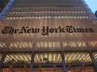 The New York Times sign is displayed in front of the newspaper's midtown headquarters in New York City. The New York Times sign is displayed in front of the newspaper's midtown headquarters in New York City.