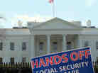A sign outside the White House on Tuesday protests part of President Obama's proposed federal budget.