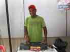 Alvaro Perez volunteers as a DJ at a socialist party stand in Caracas, Venezuela, playing songs in support of candidate Nicolas Maduro.