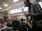 Saxophonist Harold Rapp plays during lunchtime at Alice Terry Elementary School in Sheridan, Colo. Saxophonist Harold Rapp plays during lunchtime at Alice Terry Elementary School in Sheridan, Colo.