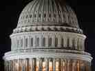 A sliver of moon rises behind the Capitol dome in Washington, D.C. While Congress has shown signs of life this spring, its veritable hibernation has left plenty of room for states to experiment with policy.