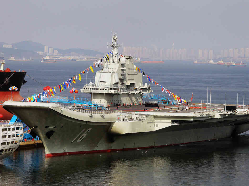 The Russian-built "Liaoning", China's first aircraft carrier, is a potent symbol of the country's growing military might. The Russian-built "Liaoning", China's first aircraft carrier, is a potent symbol of the country's growing military might.