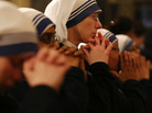 Nuns worship following a Mass for the election of a new pope at St. Patrick's Cathedral in February. Nuns worship following a Mass for the election of a new pope at St. Patrick's Cathedral in February.