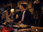 A DJ plays for a crowded street at Oakland's Art Murmur celebration in February. A DJ plays for a crowded street at Oakland's Art Murmur celebration in February.