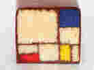 Left: One of Piet Mondrian's grid-like color block compositions. Right: Caitlin Freeman's cake homage.
