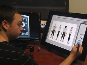 Student Daniel Freeman, 24, uses a graphics tablet to make digital artwork during lunch at nonPareil. Student Daniel Freeman, 24, uses a graphics tablet to make digital artwork during lunch at nonPareil.