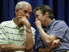Texas Republican Rep. Ron Paul and his son Rand Paul, a Republican senator from Kentucky, on stage at a campaign event in Des Moines, Iowa, in 2011. At the time, the elder Paul was seeking the Republican nomination for president. He's now retired from Congress, and the younger Paul says he's "considering" his own 2016 bid. Texas Republican Rep. Ron Paul and his son Rand Paul, a Republican senator from Kentucky, on stage at a campaign event in Des Moines, Iowa, in 2011. At the time, the elder Paul was seeking the Republican nomination for president. He's now retired from Congress, and the younger Paul says he's "considering" his own 2016 bid.