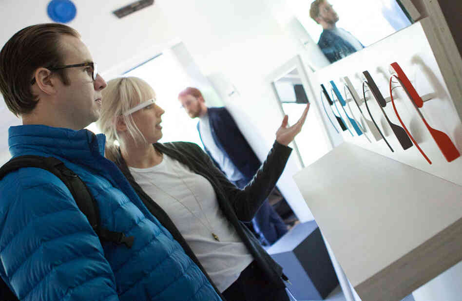 A Google staff member shows a Google Glass customer color options on Tuesday. The company selected most of the test group members based on their ideas for using the gadget. A Google staff member shows a Google Glass customer color options on Tuesday. The company selected most of the test group members based on their ideas for using the gadget.