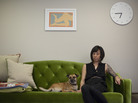 Graphic designer Kaleena Porter sits with her dog, Moby, in the living room of her new home in Washington, D.C. Graphic designer Kaleena Porter sits with her dog, Moby, in the living room of her new home in Washington, D.C.