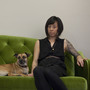 Graphic designer Kaleena Porter sits with her dog, Moby, in the living room of her new home in Washington, D.C. Graphic designer Kaleena Porter sits with her dog, Moby, in the living room of her new home in Washington, D.C.