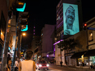 A portrait is projected on the walls of a building as part of a project promoting art through re-evaluating urban spaces and buildings in Sao Paulo, Brazil, on Nov. 22. A portrait is projected on the walls of a building as part of a project promoting art through re-evaluating urban spaces and buildings in Sao Paulo, Brazil, on Nov. 22.