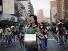 Supporters of Venezuelan opposition presidential candidate Henrique Capriles protest in the area of Altamira, in Caracas, capital of Venezuela, on Monday. Supporters of Venezuelan opposition presidential candidate Henrique Capriles protest in the area of Altamira, in Caracas, capital of Venezuela, on Monday.