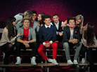 Fans pose for pictures with waxwork models of English-Irish boy band 'One Direction' at Madame Tussauds in London this week. Fans pose for pictures with waxwork models of English-Irish boy band 'One Direction' at Madame Tussauds in London this week.