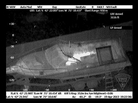 An infrared photograph taken from a police helicopter shows Tsarnaev in the boat's cockpit. An infrared photograph taken from a police helicopter shows Tsarnaev in the boat's cockpit.