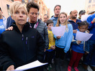 People participate in an interfaith memorial service with members of six churches near the site of Monday's Boston Marathon bombings. People participate in an interfaith memorial service with members of six churches near the site of Monday's Boston Marathon bombings.