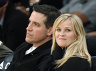 Actress Reese Witherspoon and her husband, Jim Toth, watch an NBA basketball game in Los Angeles in March. Actress Reese Witherspoon and her husband, Jim Toth, watch an NBA basketball game in Los Angeles in March.