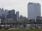 The Cira Centre, right, was illuminated Friday night with LED lights, transforming it into a giant screen to play the video game Pong.