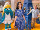 Actors Katy Perry and Neil Patrick Harris pose with Smurfette in Cancun, Mexico.