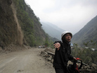 As rocks and dirt tumble down a mountainside (at left), a police officer urges people to stay back on a road in Baoxing county, Sichuan province, on Monday. Rescuers are having a hard time getting to victims of Saturday's strong earthquake because of aftershocks and landslides. As rocks and dirt tumble down a mountainside (at left), a police officer urges people to stay back on a road in Baoxing county, Sichuan province, on Monday. Rescuers are having a hard time getting to victims of Saturday's strong earthquake because of aftershocks and landslides.