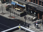 An investigator inspects the area near a surveillance camera on the roof of the Lord & Taylor store near the Boston Marathon finish line on Thursday. That camera provided the first glimpse of the men who allegedly planted the bombs. An investigator inspects the area near a surveillance camera on the roof of the Lord & Taylor store near the Boston Marathon finish line on Thursday. That camera provided the first glimpse of the men who allegedly planted the bombs.