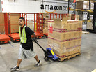 Humberto Manzano Jr. moves a pallet of goods at an Amazon.com fulfillment center in Phoenix in 2010. Amazon has endorsed a bill making its way through the Senate that would require more online retailers to collect sales tax. Humberto Manzano Jr. moves a pallet of goods at an Amazon.com fulfillment center in Phoenix in 2010. Amazon has endorsed a bill making its way through the Senate that would require more online retailers to collect sales tax.