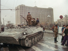 A Chechen separatist soldier stands on an APC, guarding the presidential palace on Grozny's central square, on November 25, 1994. Tension is rising in Grozny following a buildup of Russian troops along the border with the breakaway Chechen republic. (Photo credit should read IVAN SHLAMOV/AFP/Getty Images)
