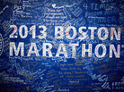 Signatures and messages adorn a Boston Marathon poster on Tuesday near the site of the April 15 bombings. Signatures and messages adorn a Boston Marathon poster on Tuesday near the site of the April 15 bombings.