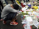 Visitors paid their respects at a makeshift memorial on Boylston Street on April 20, near the scene of the Boston Marathon bombings. Visitors paid their respects at a makeshift memorial on Boylston Street on April 20, near the scene of the Boston Marathon bombings.