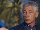 Secretary of Defense Chuck Hagel speaks with reporters on Thursday in the United Arab Emirates after reading a statement on chemical weapon use. Secretary of Defense Chuck Hagel speaks with reporters on Thursday in the United Arab Emirates after reading a statement on chemical weapon use.