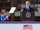 Former President George W. Bush speaks alongside former first lady Laura Bush during the opening ceremony of the George W. Bush Presidential Library and Museum on Thursday in Dallas.