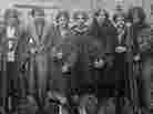 A group of young women pose for a picture in a still from the documentary Teenage, a film that explores the evolution of young adulthood in America and abroad.