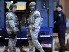 SWAT team members stand guard on the campus of Massachusetts General Hospital following the explosions at the finish line of the Boston Marathon. SWAT team members stand guard on the campus of Massachusetts General Hospital following the explosions at the finish line of the Boston Marathon.
