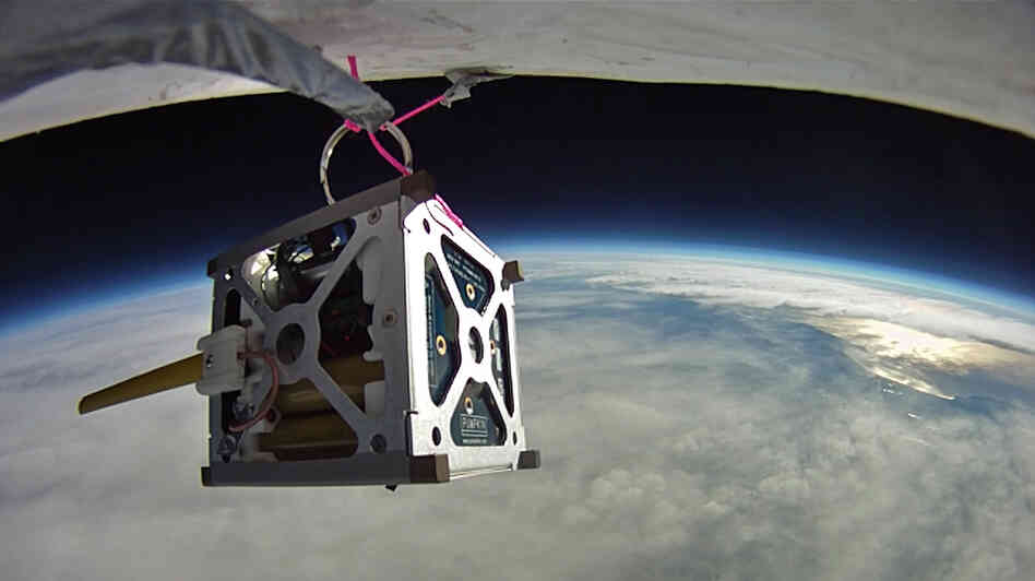 Three PhoneSats, like the one seen here during a high-altitude balloon test, were launched into space on Sunday. The slightly modified cellphone satellites cost a few thousand dollars in parts. Three PhoneSats, like the one seen here during a high-altitude balloon test, were launched into space on Sunday. The slightly modified cellphone satellites cost a few thousand dollars in parts.