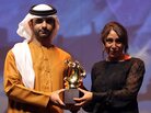 Saudi Arabia film director Haifaa Al-Mansour (right) receives the award of best film for her movie Wadjda at Dubai International Film Festival in Dubai, United Arab Emirates, on Dec. 16, 2012. Saudi Arabia film director Haifaa Al-Mansour (right) receives the award of best film for her movie Wadjda at Dubai International Film Festival in Dubai, United Arab Emirates, on Dec. 16, 2012.
